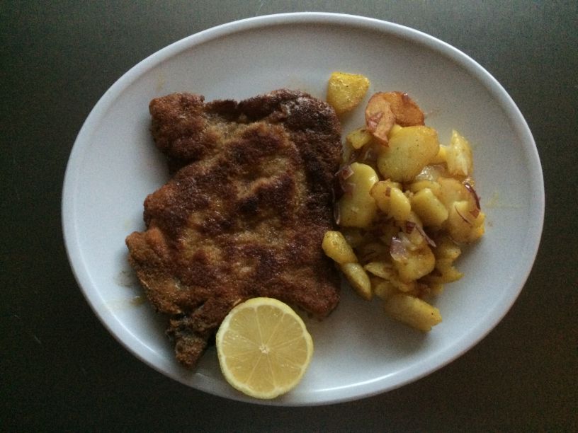 Teller Schweine Kotelett mit Bratkartoffeln